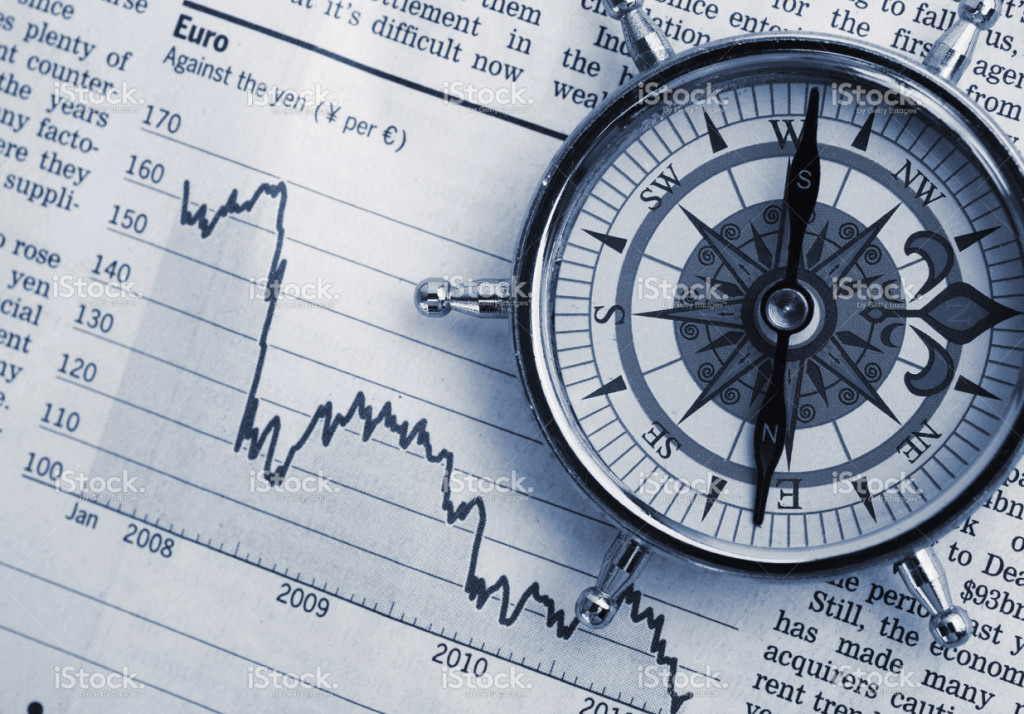 stock-photo-75715671-compass-on-stock-market-charts